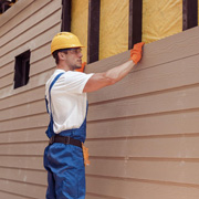 Siding installation with house wrap and weather protection